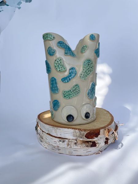 Flakon „Dziwak” – beżowy w niebiesko-zielone łaty